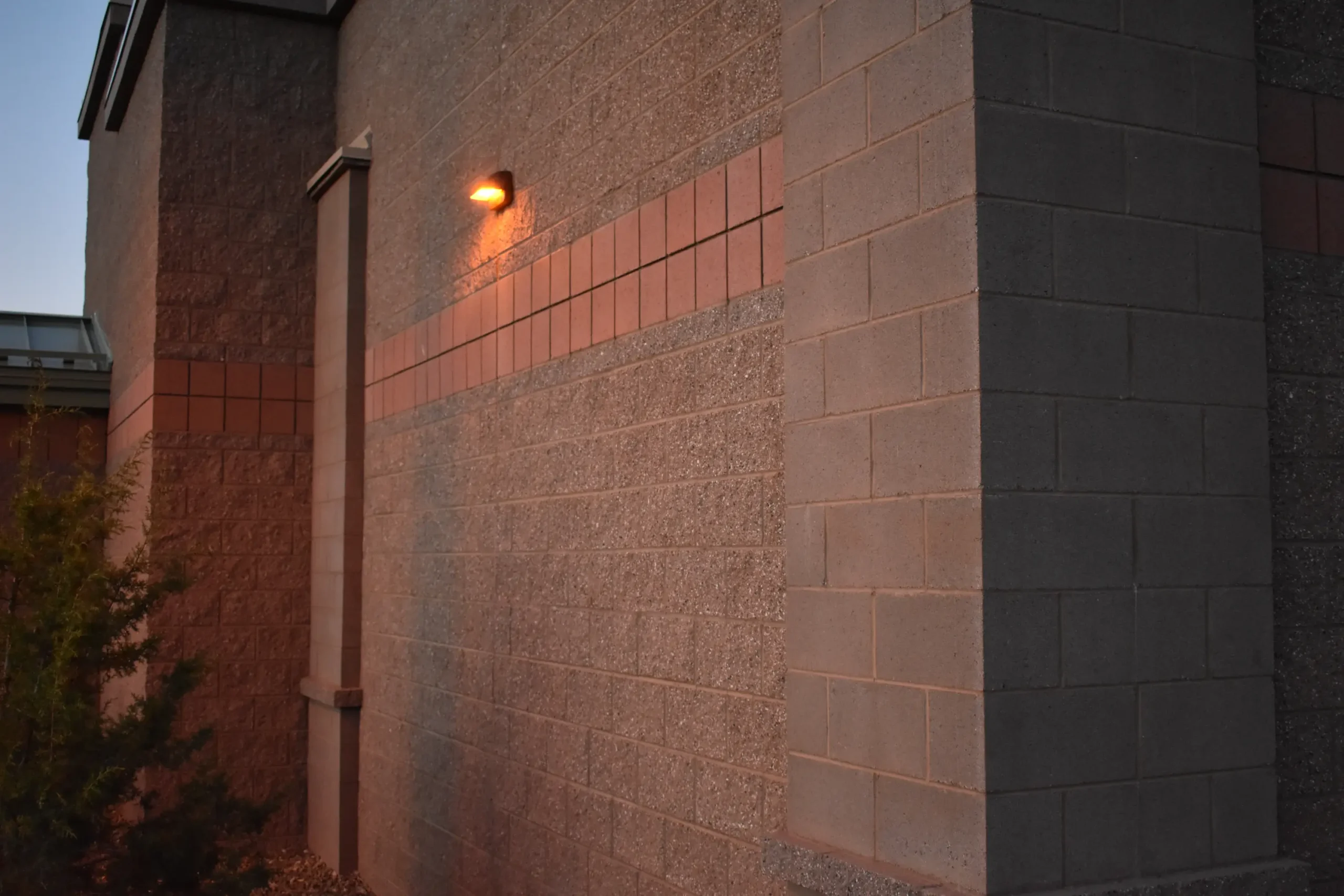 CMU commercial construction Flagstaff AZ — Starbucks Route 66 split face smooth and vertical score concrete masonry exterior