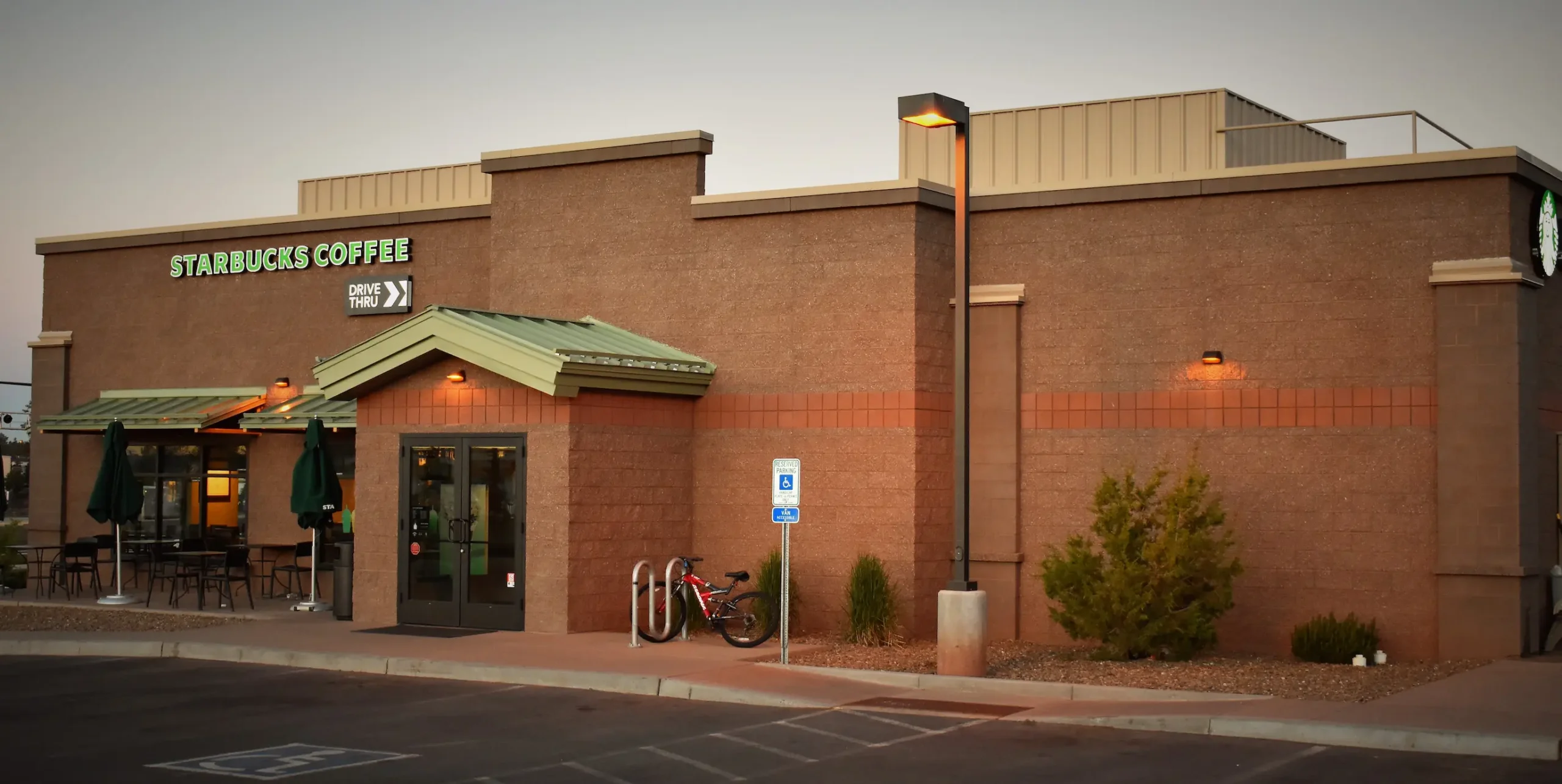 CMU commercial construction Flagstaff AZ — Starbucks Route 66 split face smooth and vertical score concrete masonry exterior