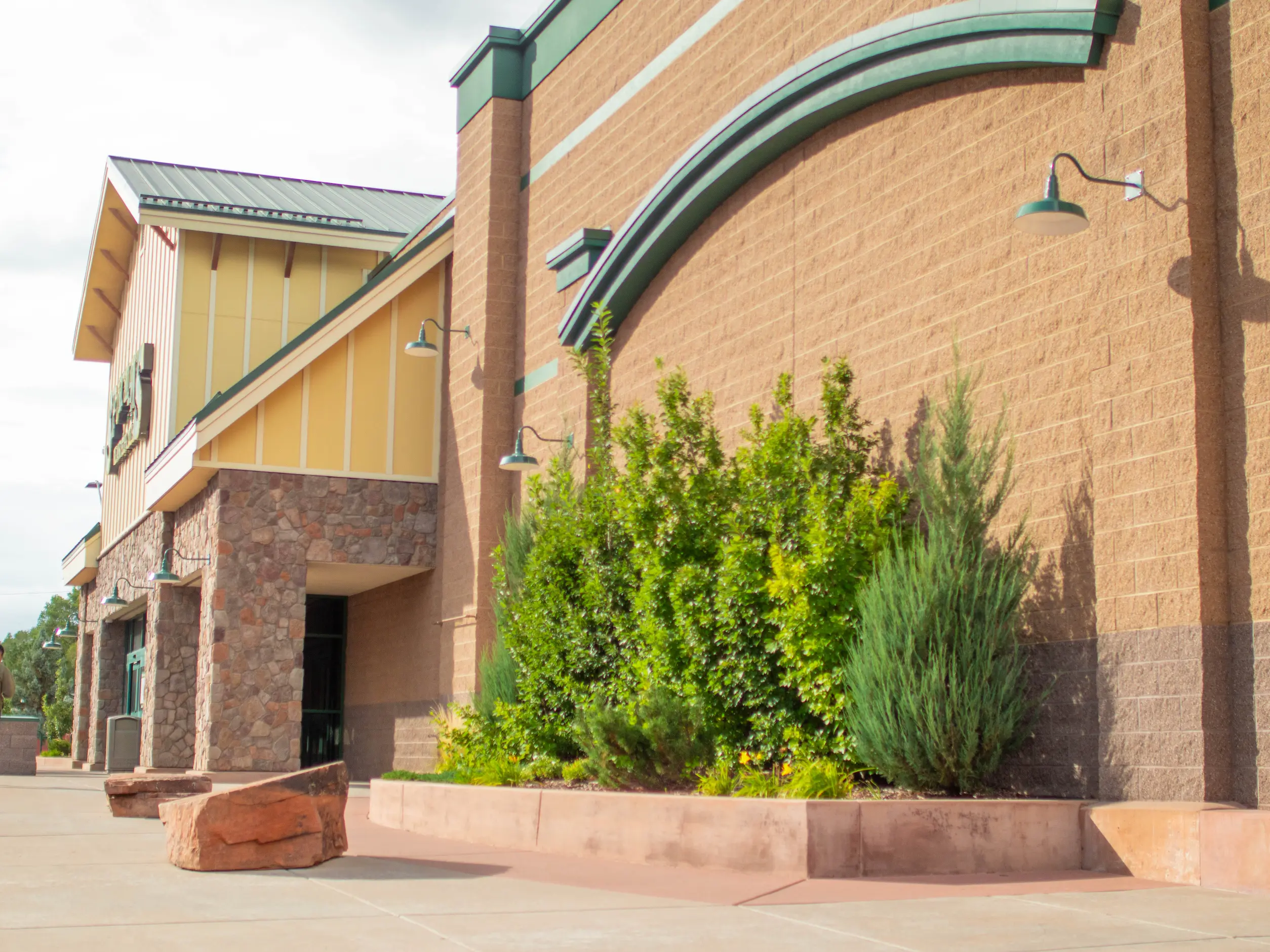 CMU commercial construction Flagstaff AZ — Sportsmans Warehouse split face Doeskin and Bark concrete masonry exterior