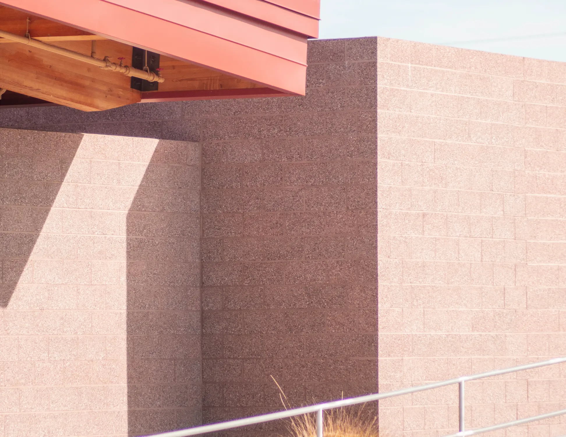 CMU civic construction Prescott AZ — Prescott Regional Airport terminal ground face Terra Cotta concrete masonry exterior