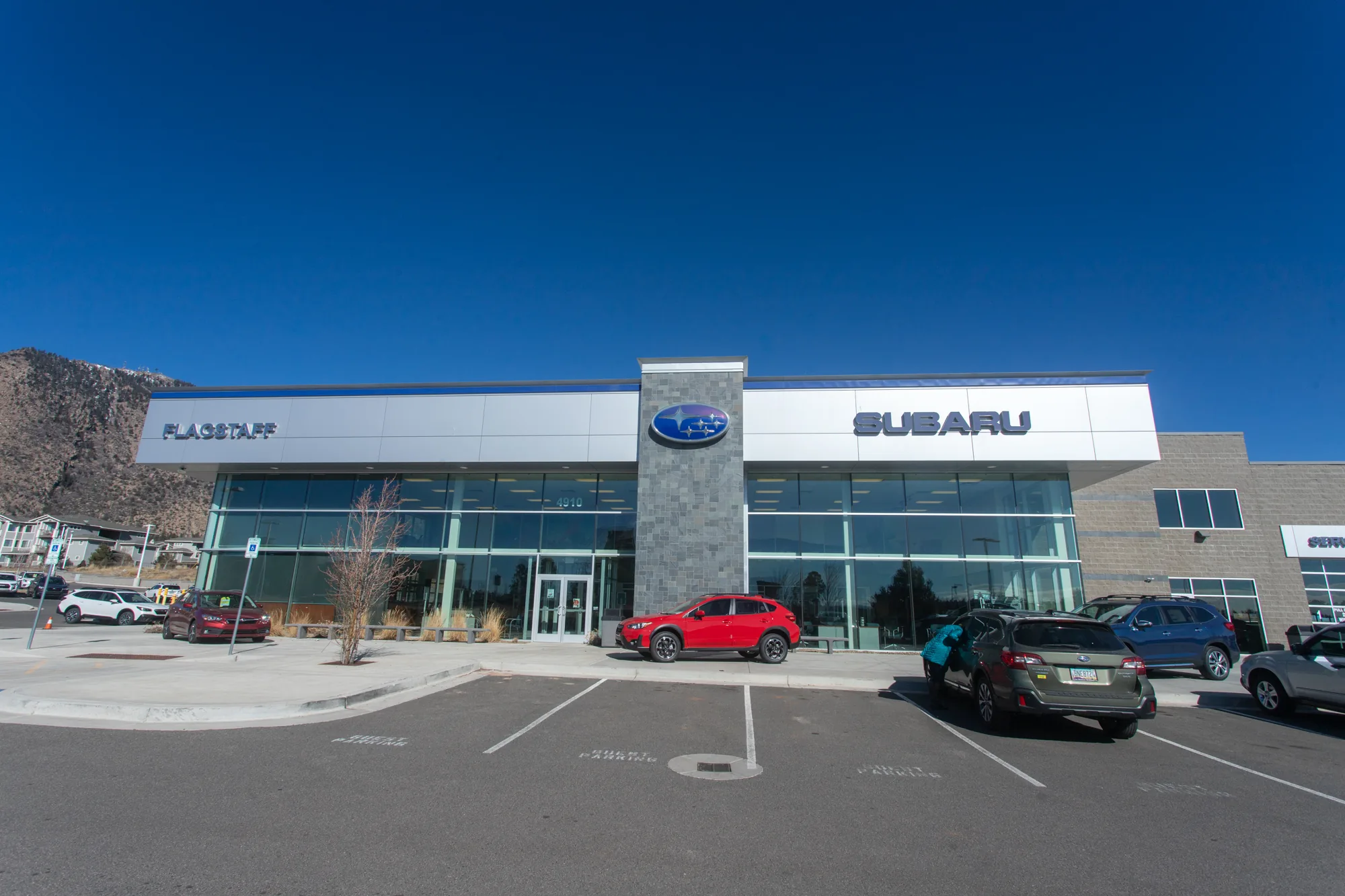 CMU commercial construction Flagstaff AZ — Flagstaff Subaru split face and smooth Grey concrete masonry
