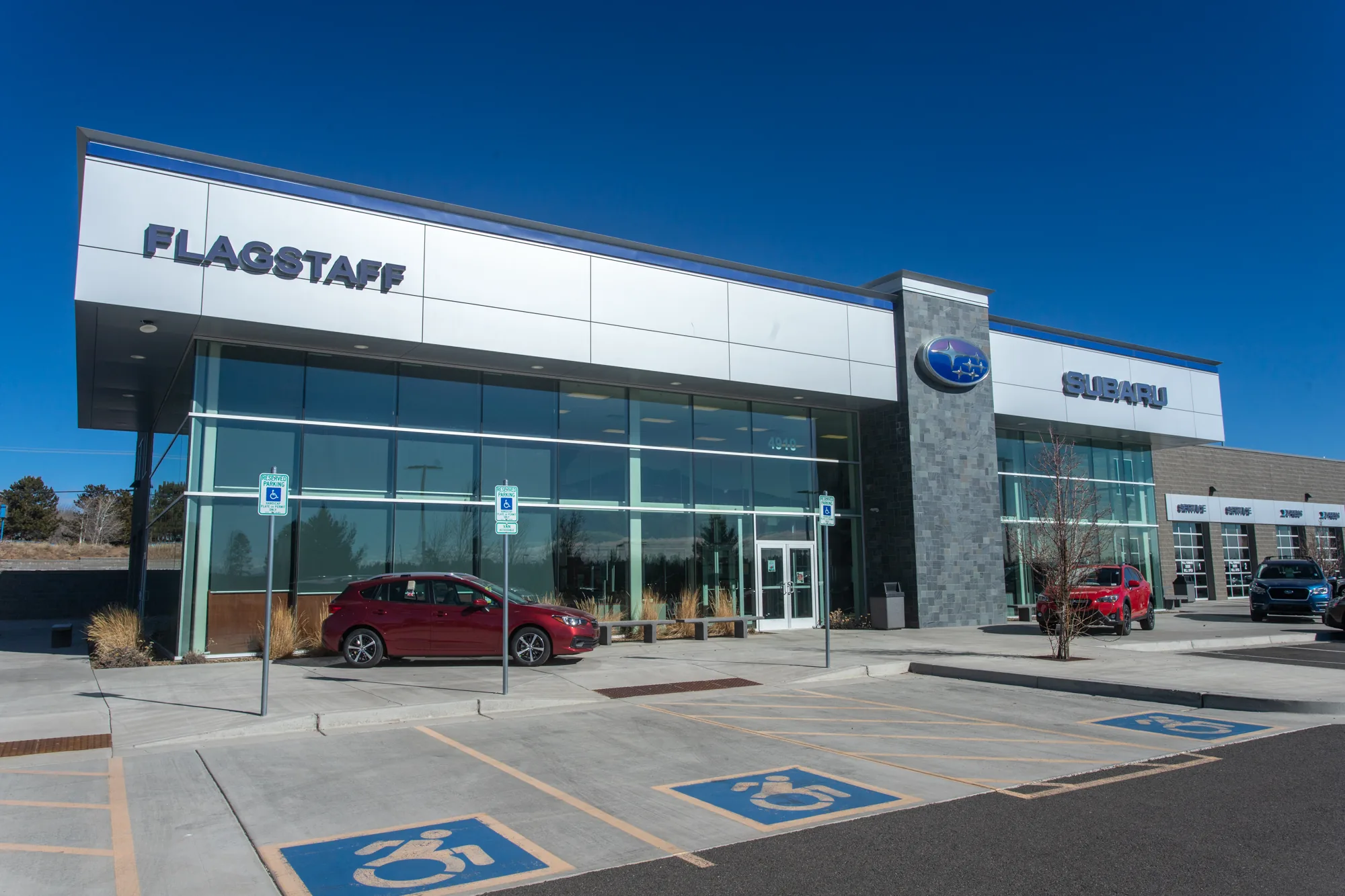CMU commercial construction Flagstaff AZ — Flagstaff Subaru split face and smooth Grey concrete masonry