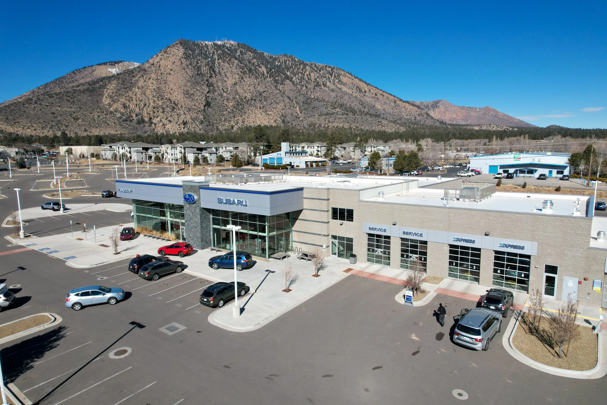 CMU commercial construction Flagstaff AZ — Flagstaff Subaru split face and smooth Grey concrete masonry