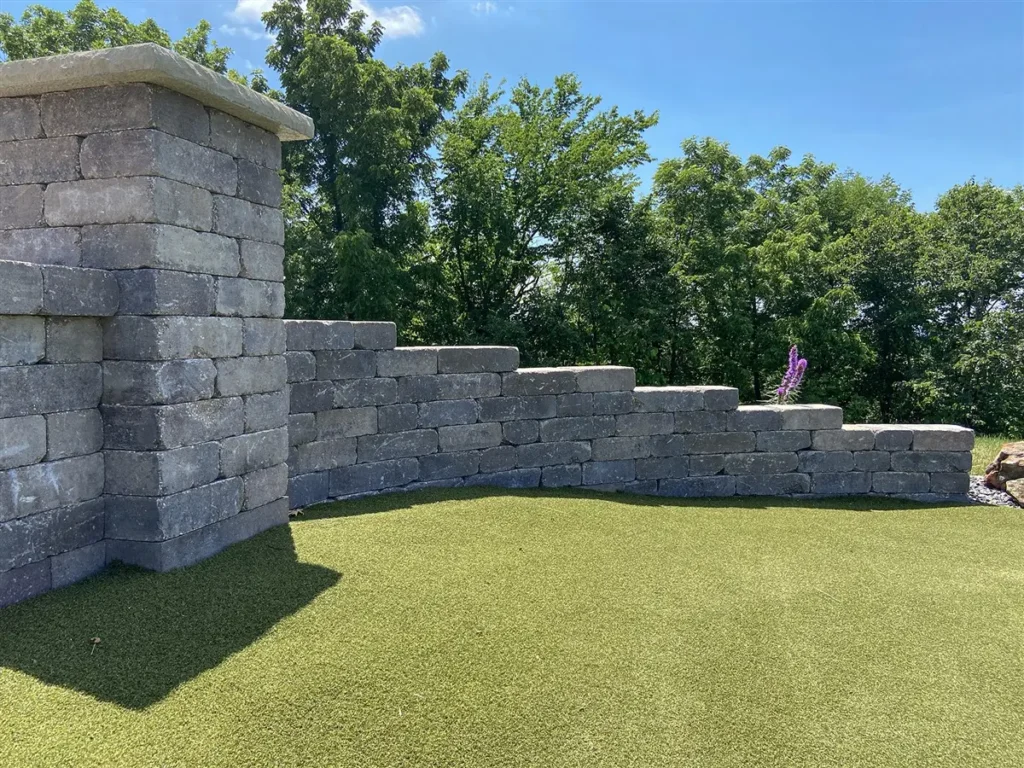 A curved retaining wall using Block-Lite blocks and pavers.